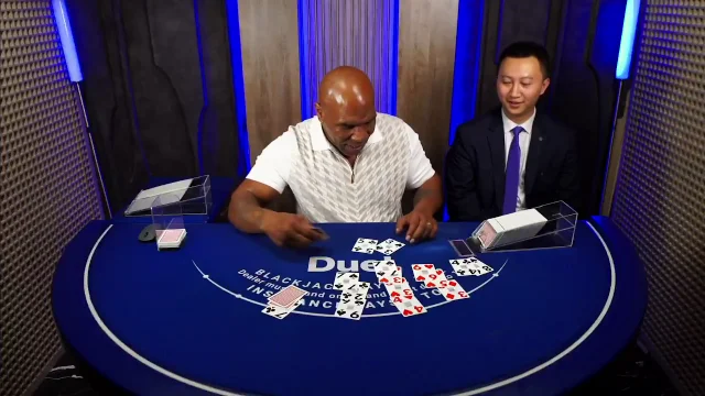 Mike Tyson dealing at the Duel blackjack table